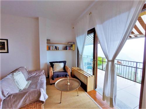 A balcony or terrace at Belvilla by OYO PAN03 3 - Residenza Panorama