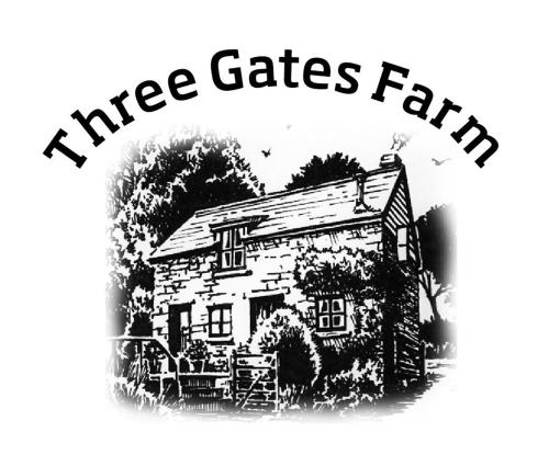 a black and white picture of a three gates farm house at The Long Barn nr Huntsham in Tiverton