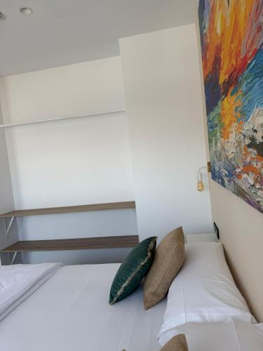 Ein Bett oder Betten in einem Zimmer der Unterkunft Hotel Playa de la Plata
