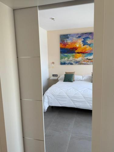 Ein Bett oder Betten in einem Zimmer der Unterkunft Hotel Playa de la Plata