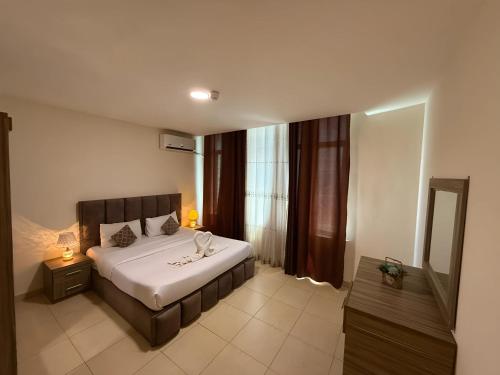 Ryan Hotel Suitesにあるベッド
