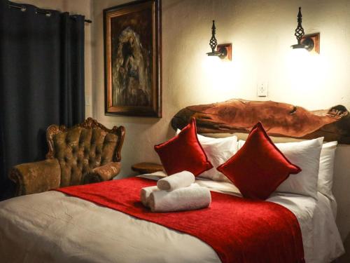 Ένα ή περισσότερα κρεβάτια σε δωμάτιο στο The Red Oak Guesthouse