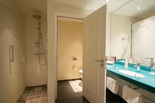 Bilik mandi di Fletcher Parkhotel De Wiemsel
