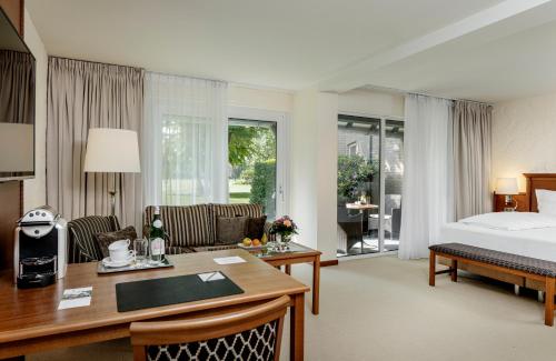 Katil atau katil-katil dalam bilik di Fletcher Parkhotel De Wiemsel