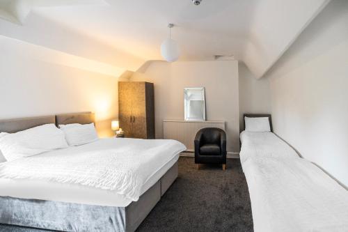 Postel nebo postele na pokoji v ubytování OYO A Better Night Hotel Limited
