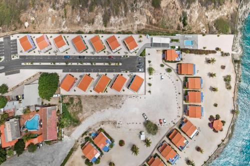 an aerial view of a resort next to the ocean at Bon Azul 5A in Westpunt