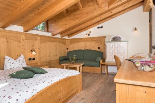 Postel nebo postele na pokoji v ubytování Garnì Val de Grepa