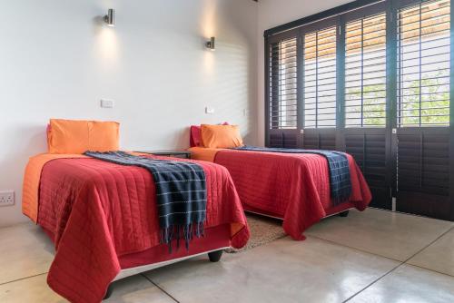 Katil atau katil-katil dalam bilik di Zebula Golf Estate & Spa Executive Holiday Homes