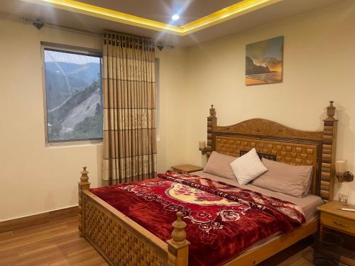 Ένα ή περισσότερα κρεβάτια σε δωμάτιο στο Rock & Green Hotel, Mahandri