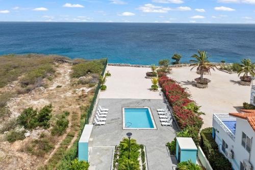 an aerial view of the ocean from a building at Punta Azul Ocean Resort 6A in Westpunt