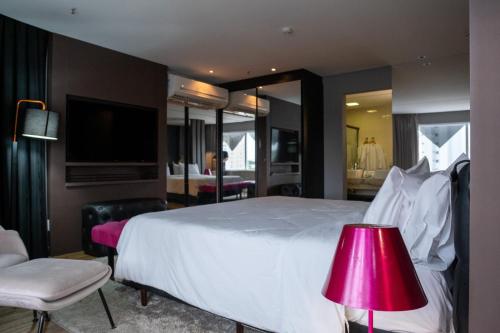 Postel nebo postele na pokoji v ubytování QS Marista Hotel by Atlas
