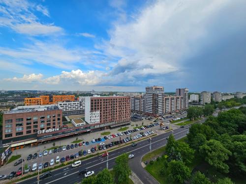an overhead view of a city with traffic on a highway at Apartment 98 at Park Residence in Lviv