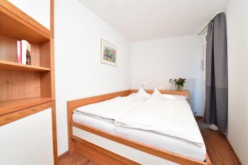Letto o letti in una camera di Familienhotel Kleinwalsertal