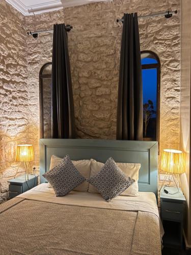 Кровать или кровати в номере Villa Mamma Giò