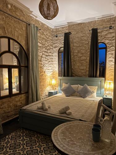 Кровать или кровати в номере Villa Mamma Giò