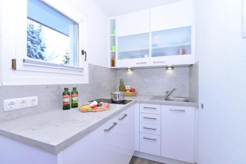 Cucina o angolo cottura di Familienhotel Kleinwalsertal