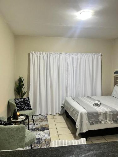 Postel nebo postele na pokoji v ubytování Apartel 477 on Bains