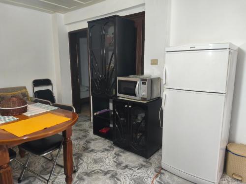 Kuchyň nebo kuchyňský kout v ubytování oneTwoSleep GuestHouse