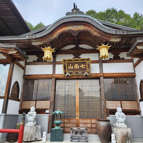 an entrance to a temple with a large window at Picturesque Kyoto in Habu