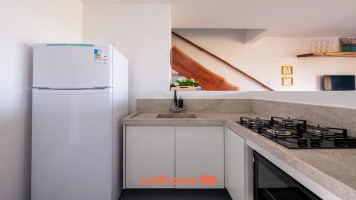 Køkken eller tekøkken på Casa em Entre Rios com Piscina Beira-Mar