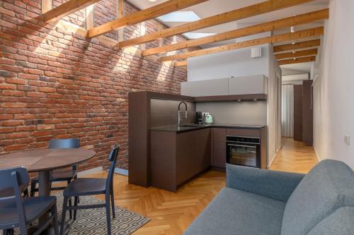 Kuchyň nebo kuchyňský kout v ubytování Roze Boutique Hotel
