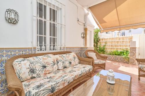 a living room with a couch and a table at Animas in Nerja
