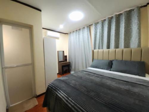 Katil atau katil-katil dalam bilik di UKG Residence