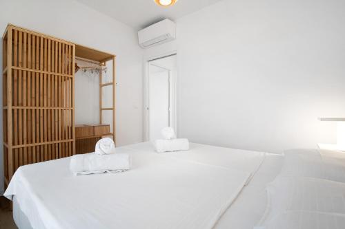 Katil atau katil-katil dalam bilik di Residence Blumar Jesolo Golf Club
