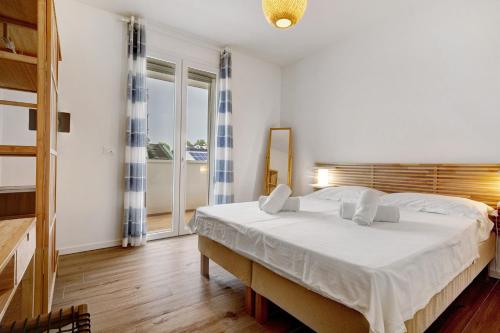 Katil atau katil-katil dalam bilik di Residence Blumar Jesolo Golf Club