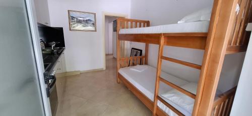 Postel nebo postele na pokoji v ubytování TreRacat Apartment
