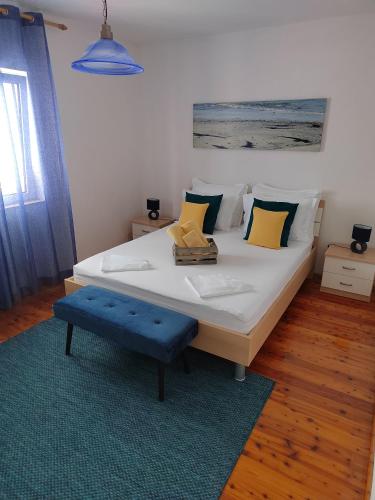 Postel nebo postele na pokoji v ubytování Apartments Marina