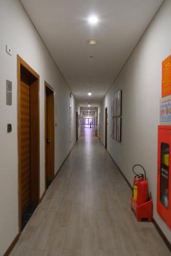 an empty hallway in a hospital with a long hall at Luxury Pentstudio Westlake - Tay Ho, Ha Noi in Hanoi