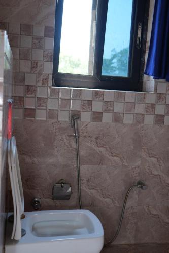 Ένα μπάνιο στο Simsar Villa Homestay