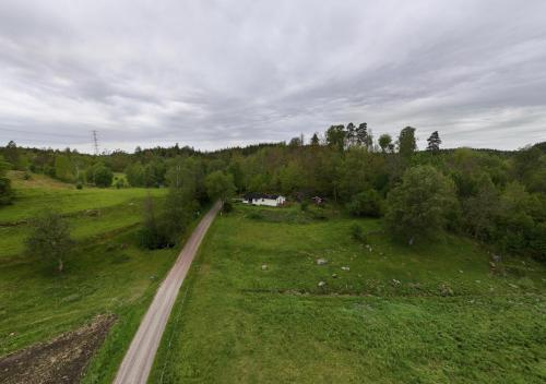 an aerial view of a road in a field at Henrys utanför Ullared in Ullared