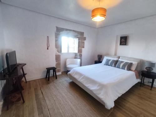 En eller flere senge i et værelse på Villa Vista Ajo