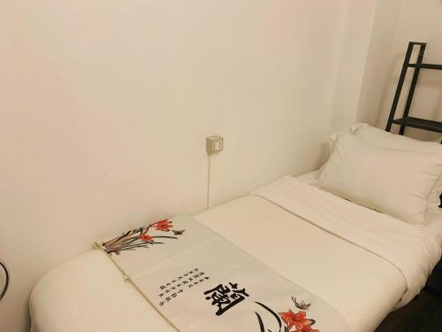 Postel nebo postele na pokoji v ubytování Shared home Wang - Private & Shared Room