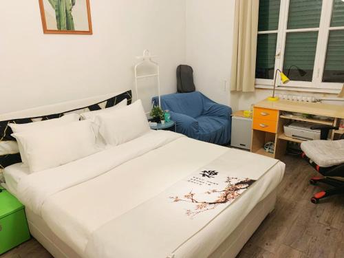 Ένα ή περισσότερα κρεβάτια σε δωμάτιο στο Oliver Shared&Private Room, Near Metro & Linate ,LGBT Friendly