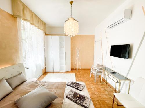 TV a/nebo společenská místnost v ubytování B&B LE CHEVALIER