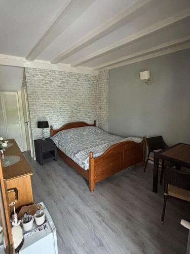 Cama o camas de una habitación en Gościniec Zośka