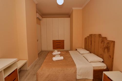 Ένα ή περισσότερα κρεβάτια σε δωμάτιο στο Luxury Apartment Square 21Tirana