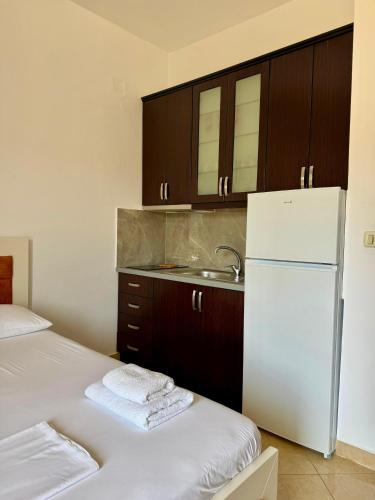 Ein Bett oder Betten in einem Zimmer der Unterkunft Guesthouse Redilka