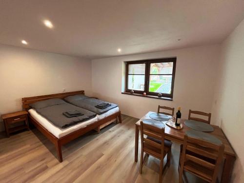 Postel nebo postele na pokoji v ubytování Apartmán Kunratice