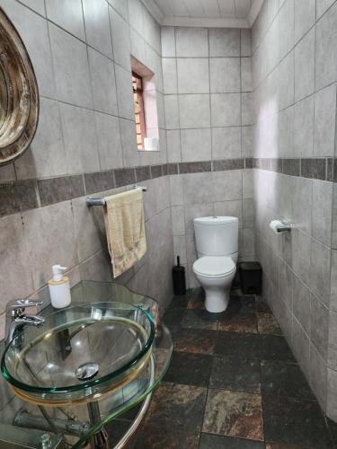 Ένα μπάνιο στο Goodnight Guest Lodge