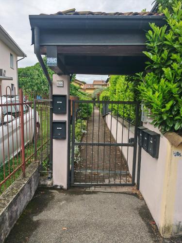 an entrance to a gate with a fence at Casa Luna in Arona