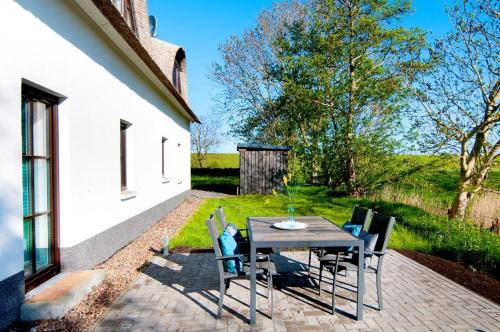 Jardín al aire libre en Erholung am Deich- Ihre Ferienwohnung in Tossens