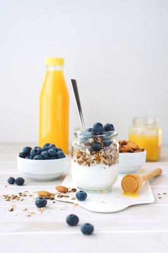 a jar of blueberry overnight oats with granola and blueberries at Sea 'N' Stars BNB in Gabriola