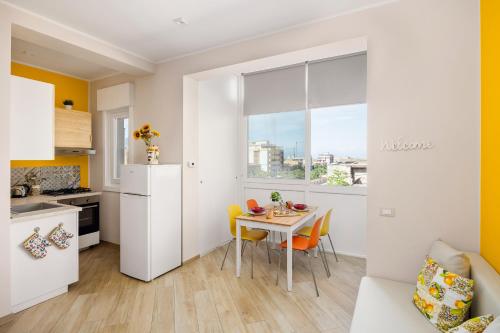 A kitchen or kitchenette at ARTrinacria Apartments - Qubba