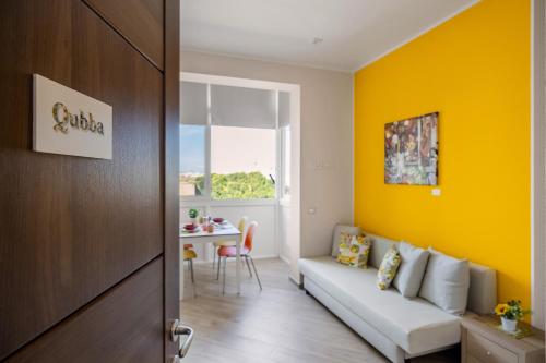 A seating area at ARTrinacria Apartments - Qubba