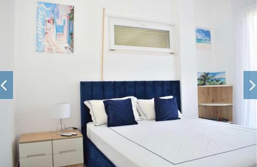 Postel nebo postele na pokoji v ubytování Villa DUA