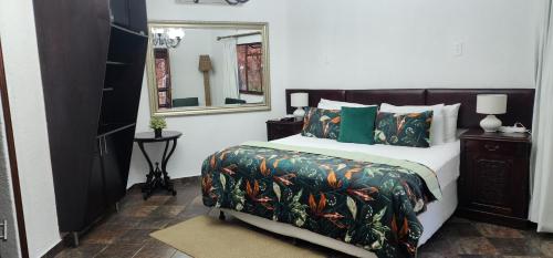 Ένα ή περισσότερα κρεβάτια σε δωμάτιο στο Goodnight Guest Lodge